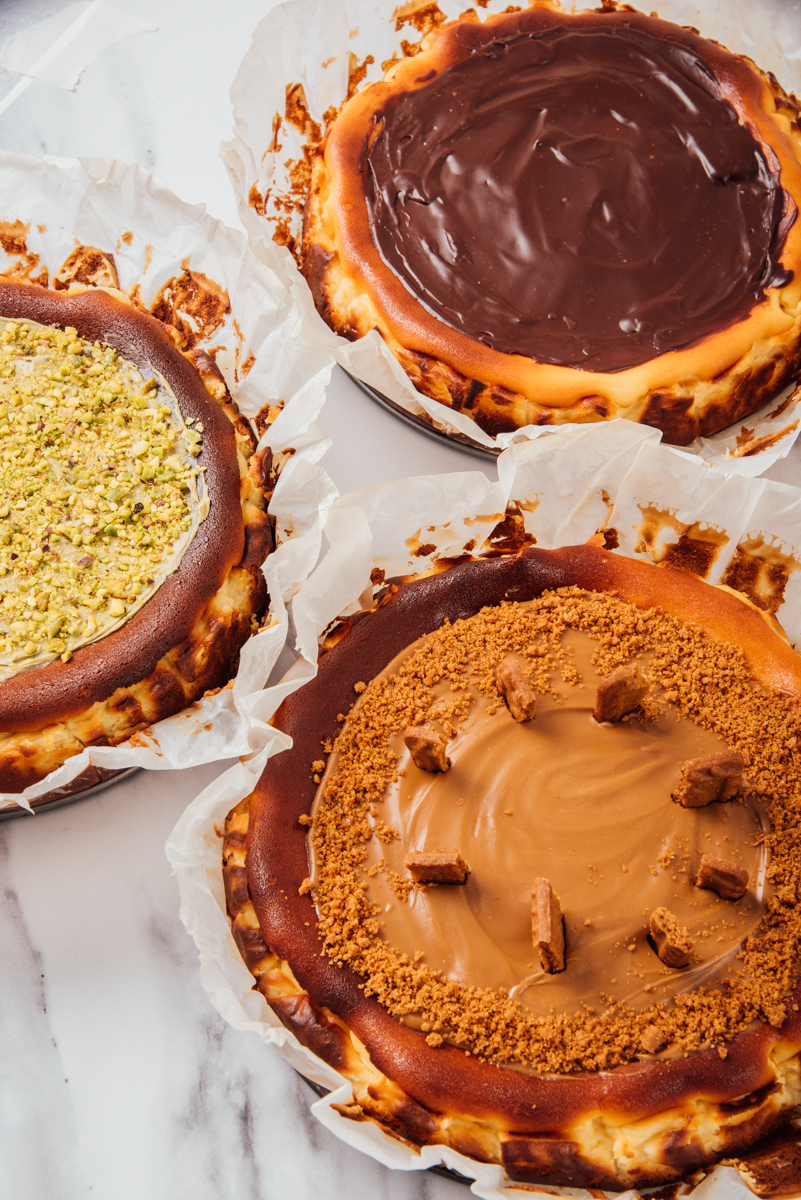 Baked burnt cheesecakes of classic flavour, pistachio and ganache chocolate topped