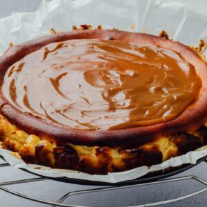 Dulce de leche or caramel topping baked cheesecake